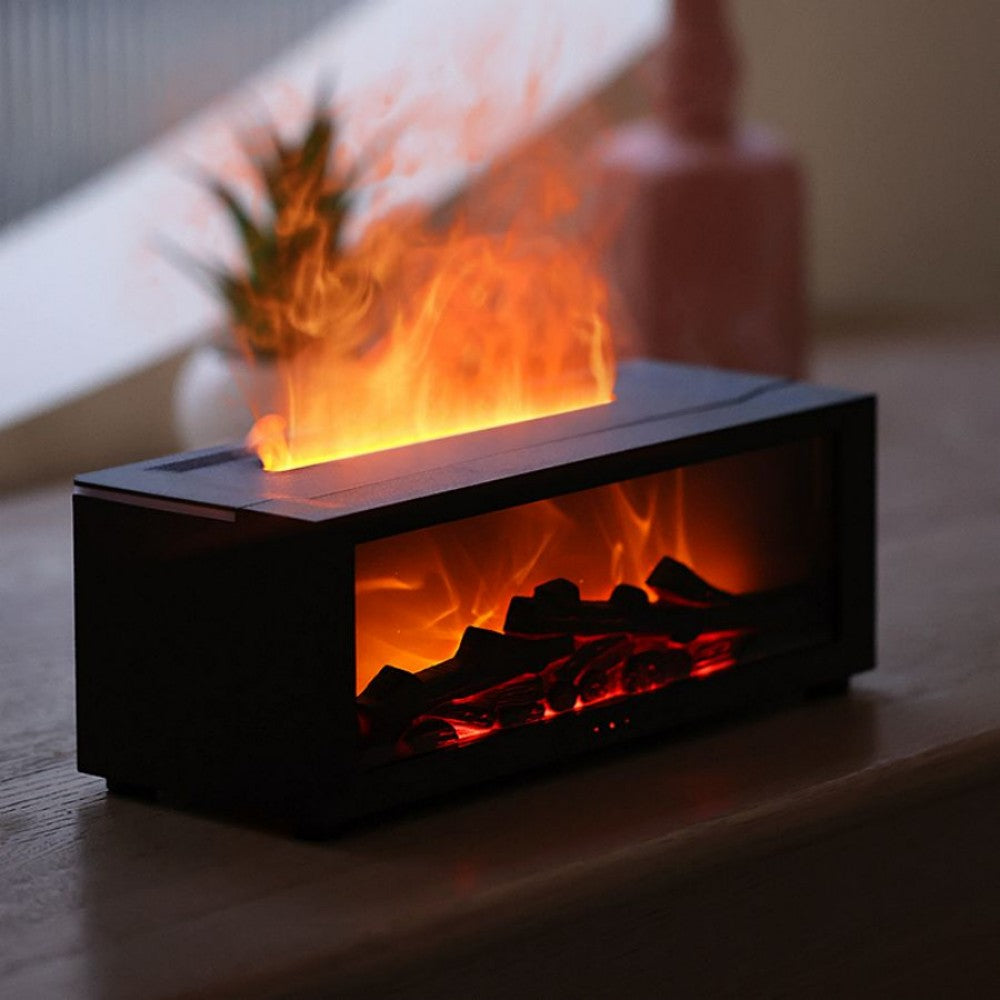 Fireplace aroma diffuser in matte black, lit on a wooden table, flame effect rising from the top