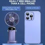 Mini Handheld & Neck Fan with Lanyard - USB Rechargeable, 5 Speed, Digital Display in use in a home setting